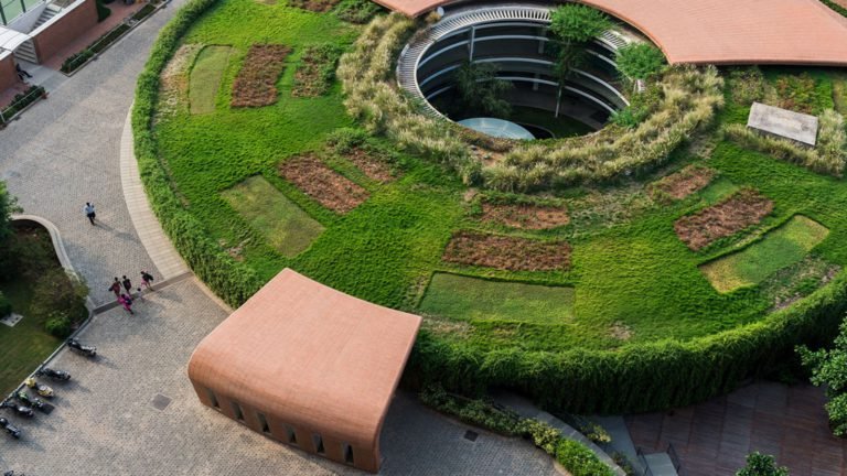 Total Environment - Windmills of Your Mind Apartment & Villa In Bangalore- Aerial view of landscaped roof of clubhouse