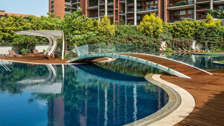 Total Environment - Windmills of Your Mind Apartment & Villa In Bangalore- Bridge over swimming pool