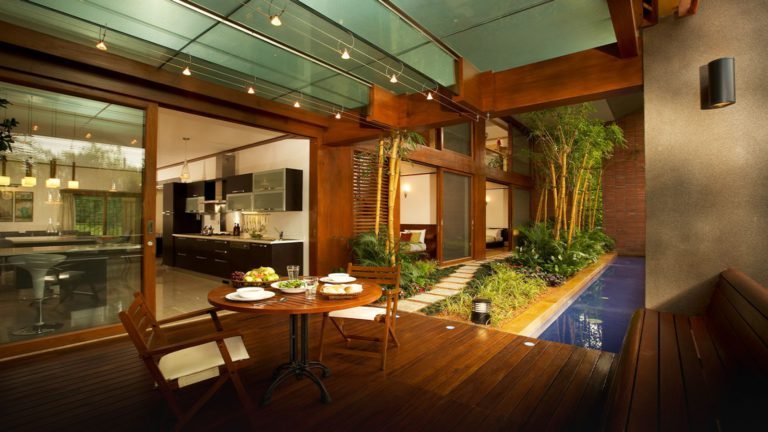 Total Environment - Windmills of Your Mind Apartment & Villa In Bangalore Duplex - living space opening into deck & garden