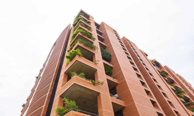 Total Environment - The Magic Faraway Tree Apartment in Bangalore- Exterior cladding that ages gracefully_1