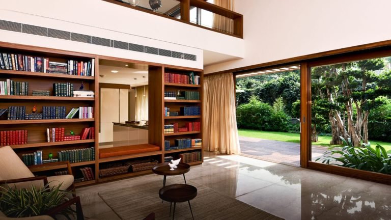 Total Environment - In That Quiet Earth Villa in Bangalore in Bangalore - Library leading to private garden