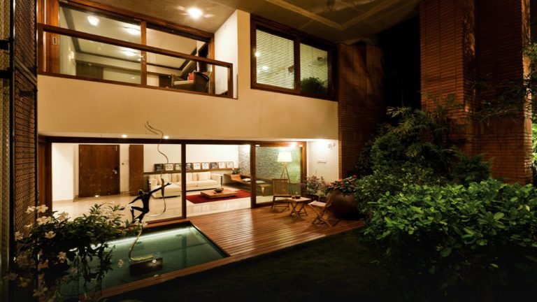 Total Environment - The Magic Faraway Tree Apartment in Bangalore Apartment in Bangalore - Private garden with water body