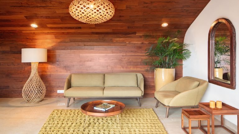 Total Environment - After the Rain - villa in bangalore Living room with warm wood tones